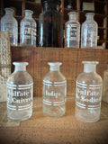 Three antique blown-glass pharmacy bottles, 19th early 20th centuries. LOT N°9