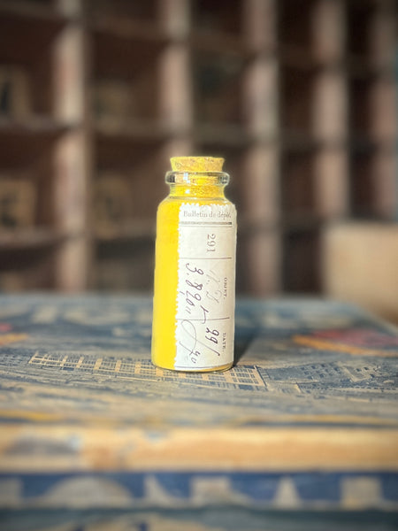 Apothecary bottle filled with yellow pigment PJ29