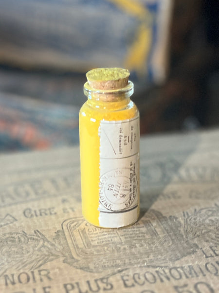 Apothecary bottle filled with yellow pigment PJ30